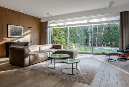 elegant living room with window wall